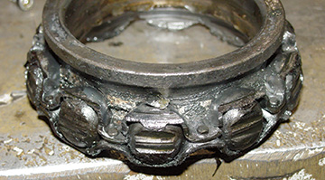 Failed riveted cage bearing