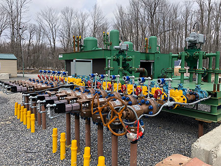 IMAGE 1: Twelve flowlines connect individual wells from the wellhead and bulk test units (Images courtesy of Seneca Resources)