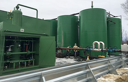 IMAGE 2: Tank battery with six tanks, where gas volume is measured and tested before pumping the gas into the pipeline system
